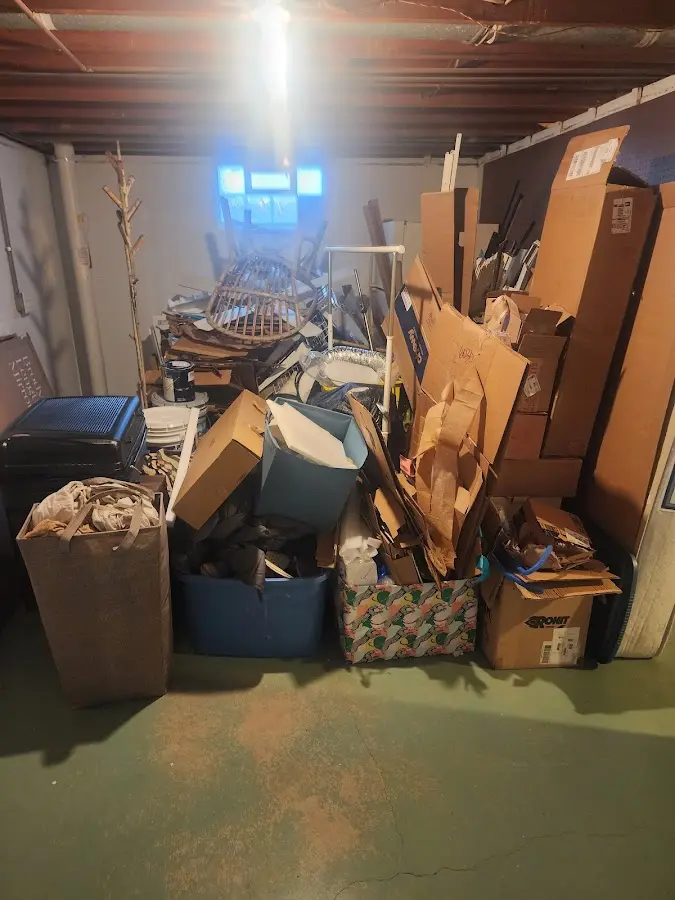 Roll-off dumpster container at job site for Yard Waste Dumpster Rental in Wahoo